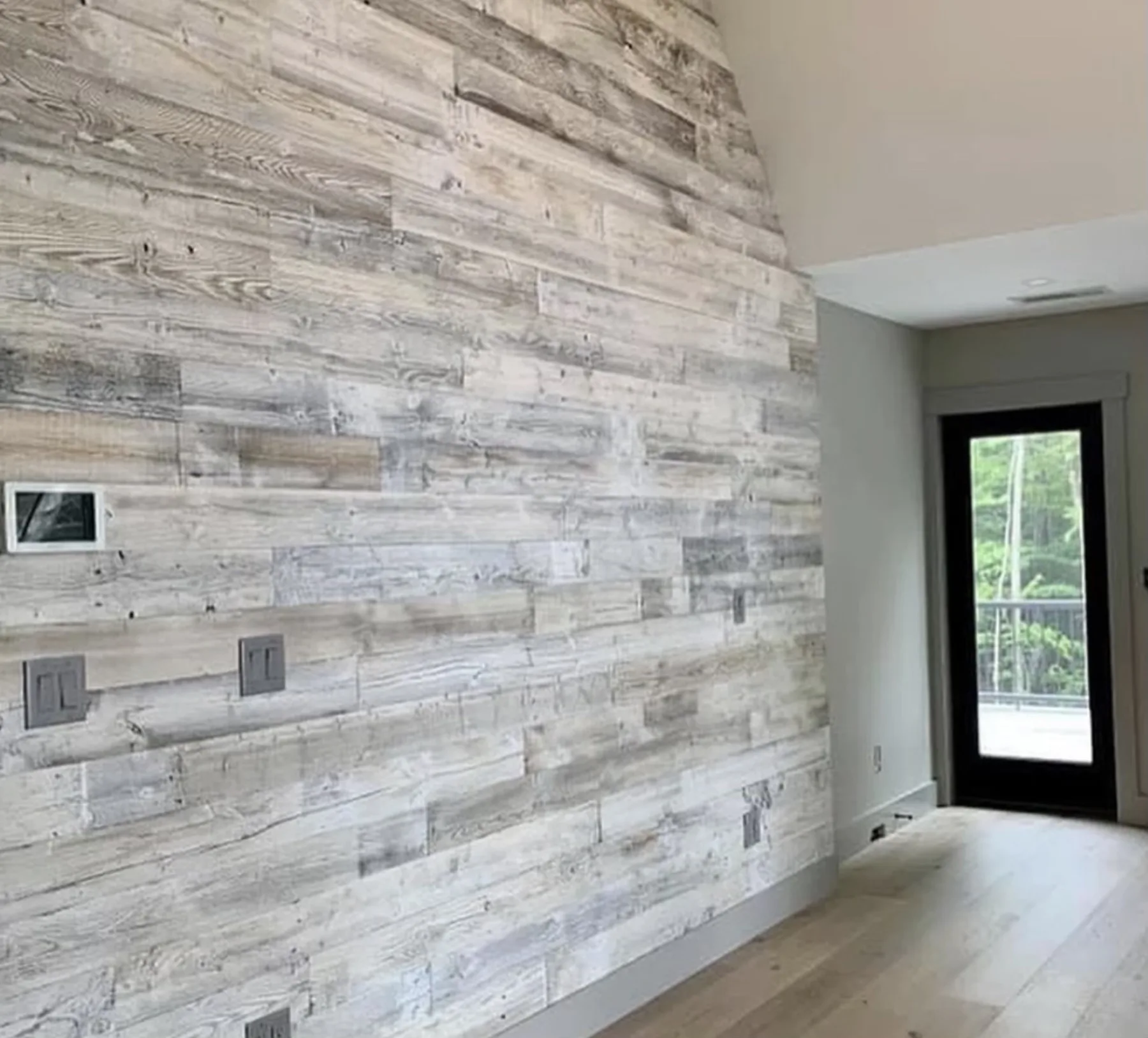 Custom wooden staircase with stained treads in a Tampa property